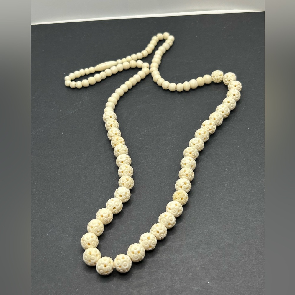 Carved beaded necklace